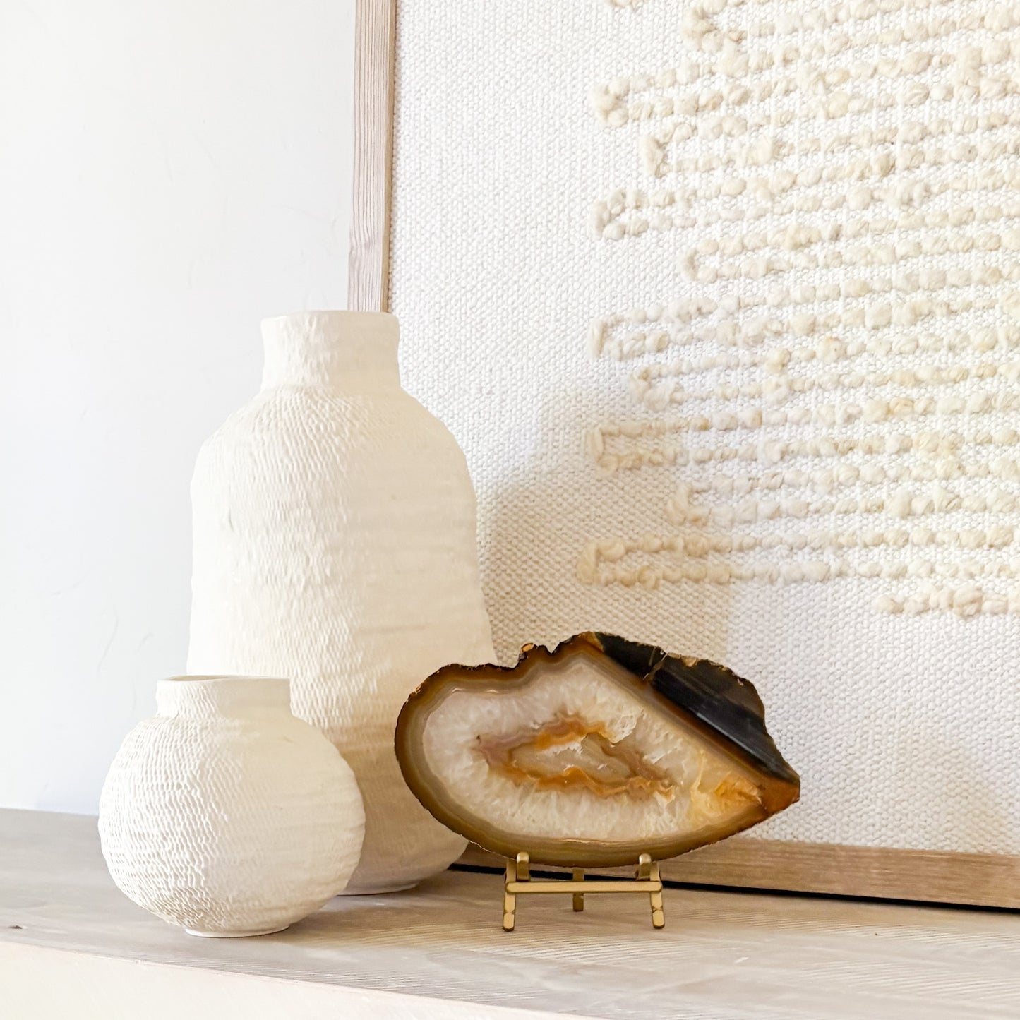 Brazilian agate display piece on stand for elegant shelf styling