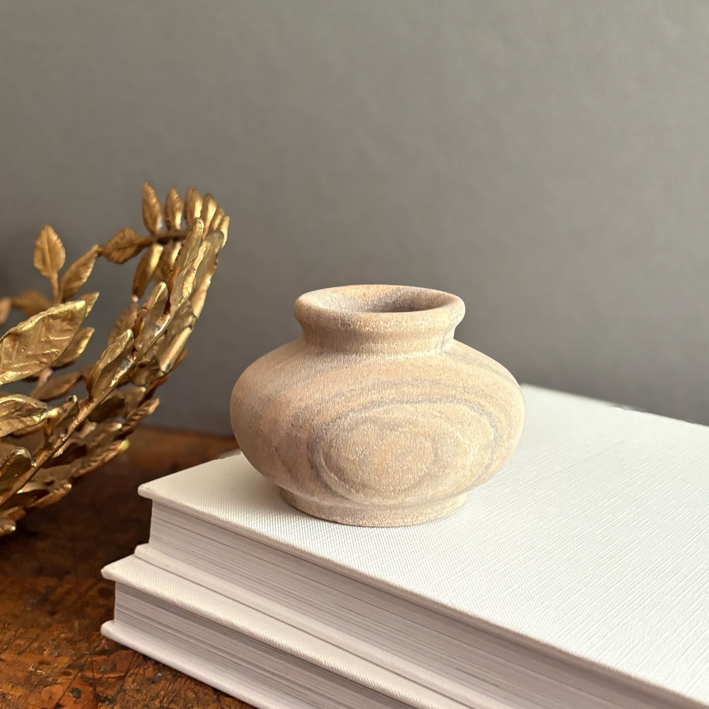 small sandstone vase