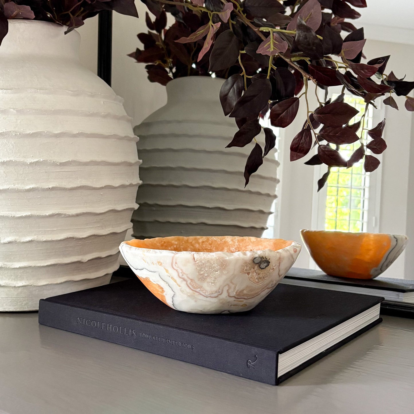 orange, white and black onyx bowl