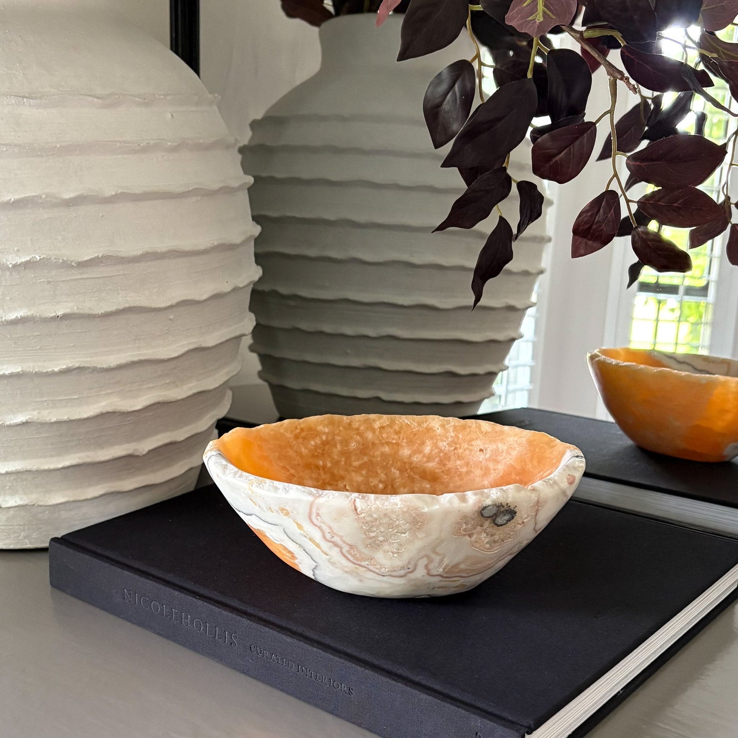 decorative orange, white and black onyx bowl