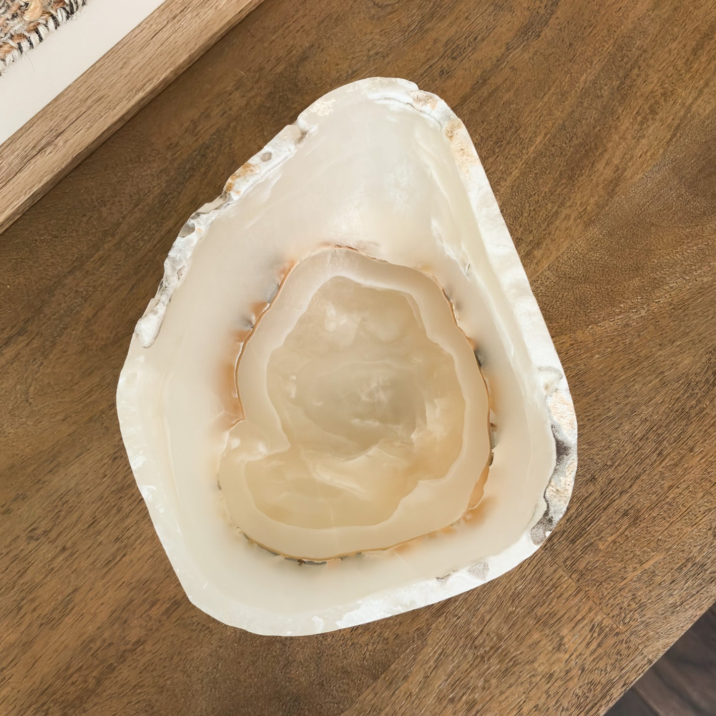Decorative natural amber onyx bowl with rich golden hues and unique stone character