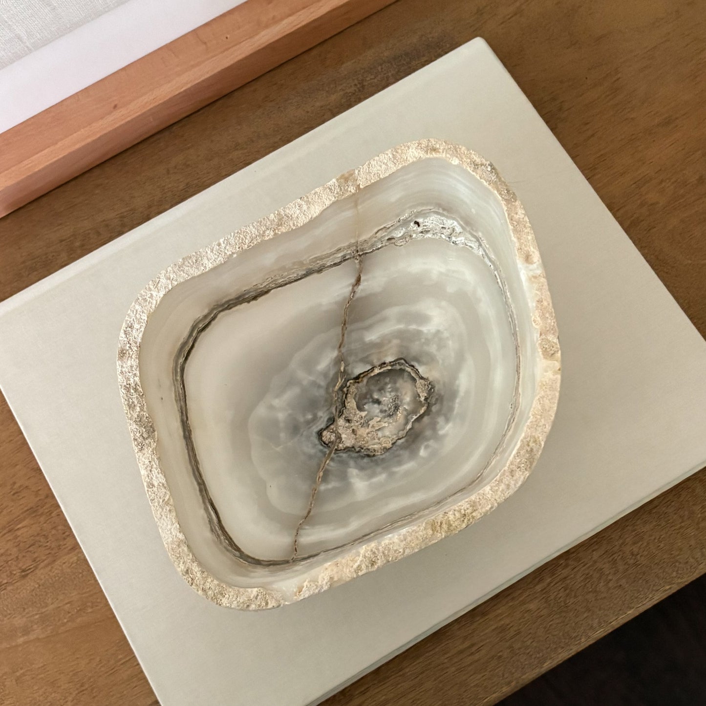 Elegant grey onyx bowl carved from solid natural stone for modern home décor.