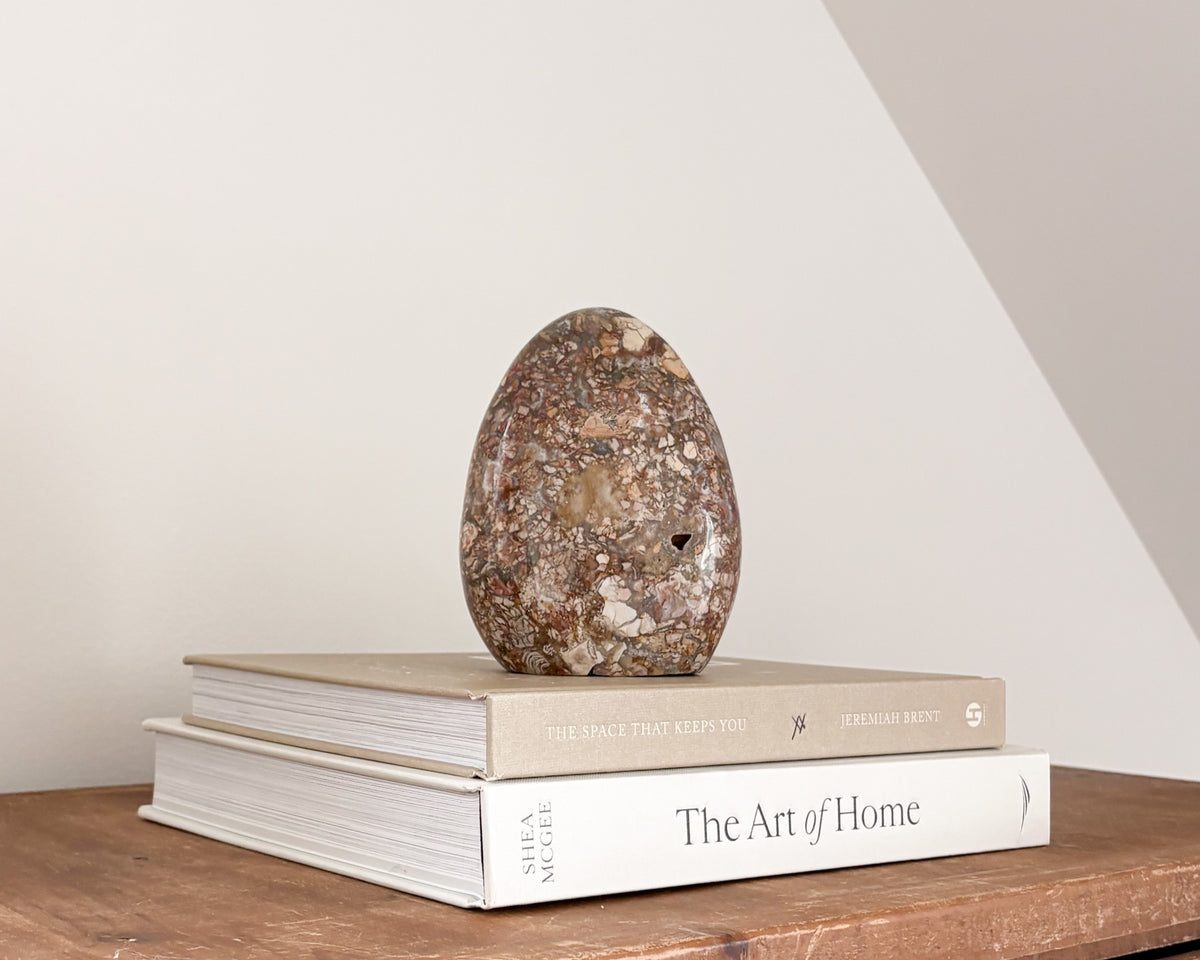 Freeform Ibis Jasper sculpture with natural veining and pattern