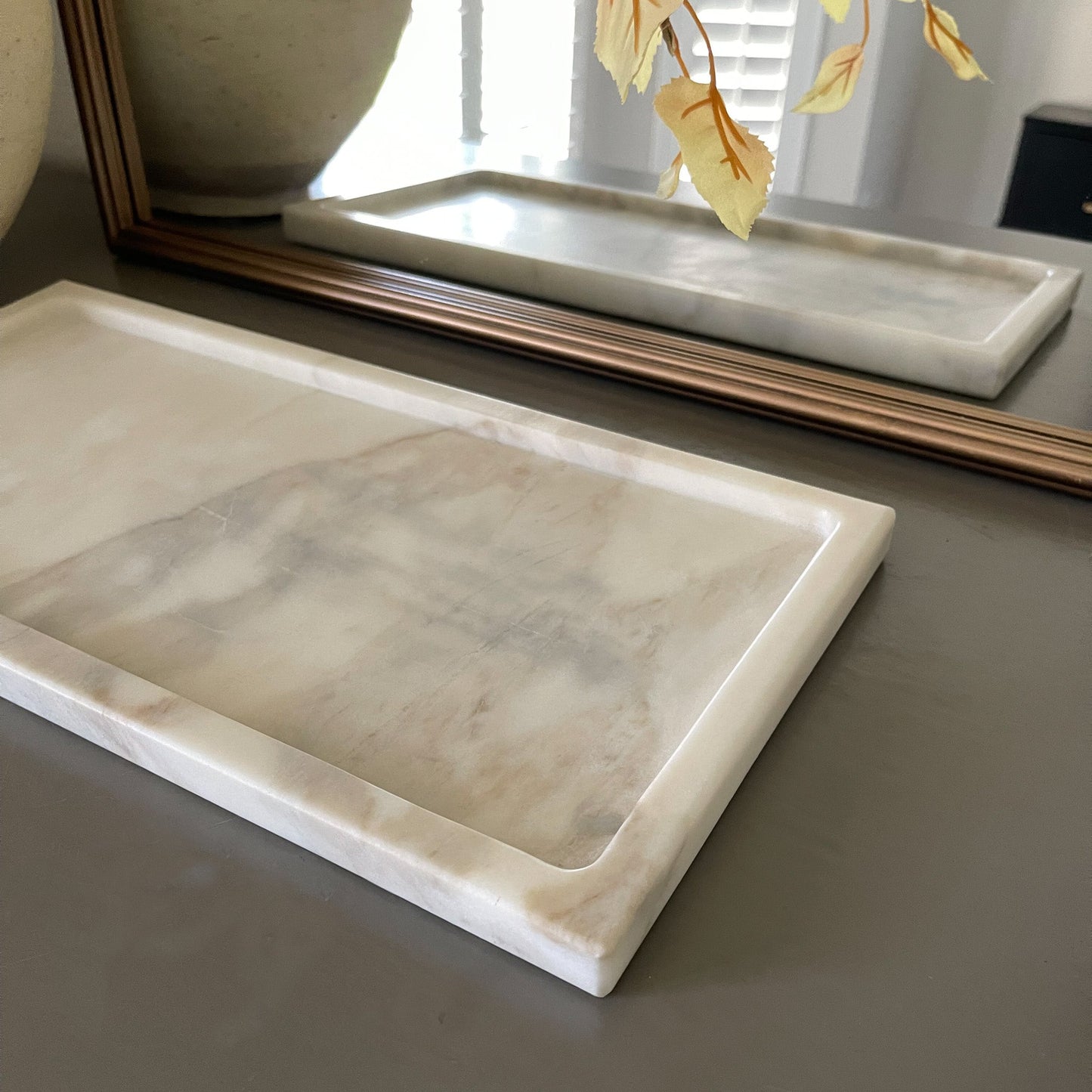 white and grey marble tray