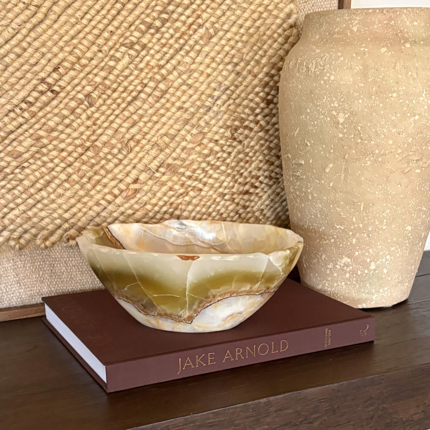 Handcrafted olive onyx bowl displayed as elegant home decor