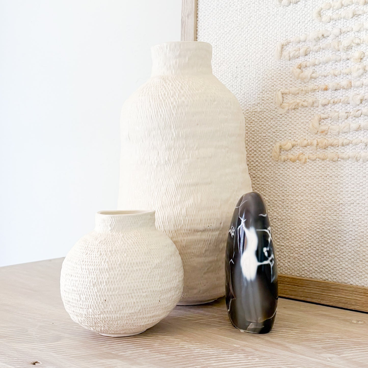 Elegant orca agate sculpture showcasing dramatic blue and white swirls reminiscent of ocean currents