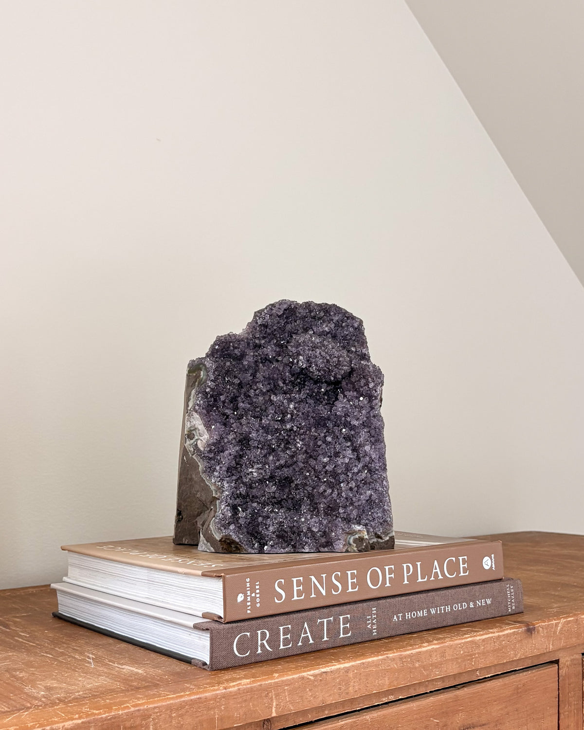 Purple rainbow amethyst geode with polished cut base