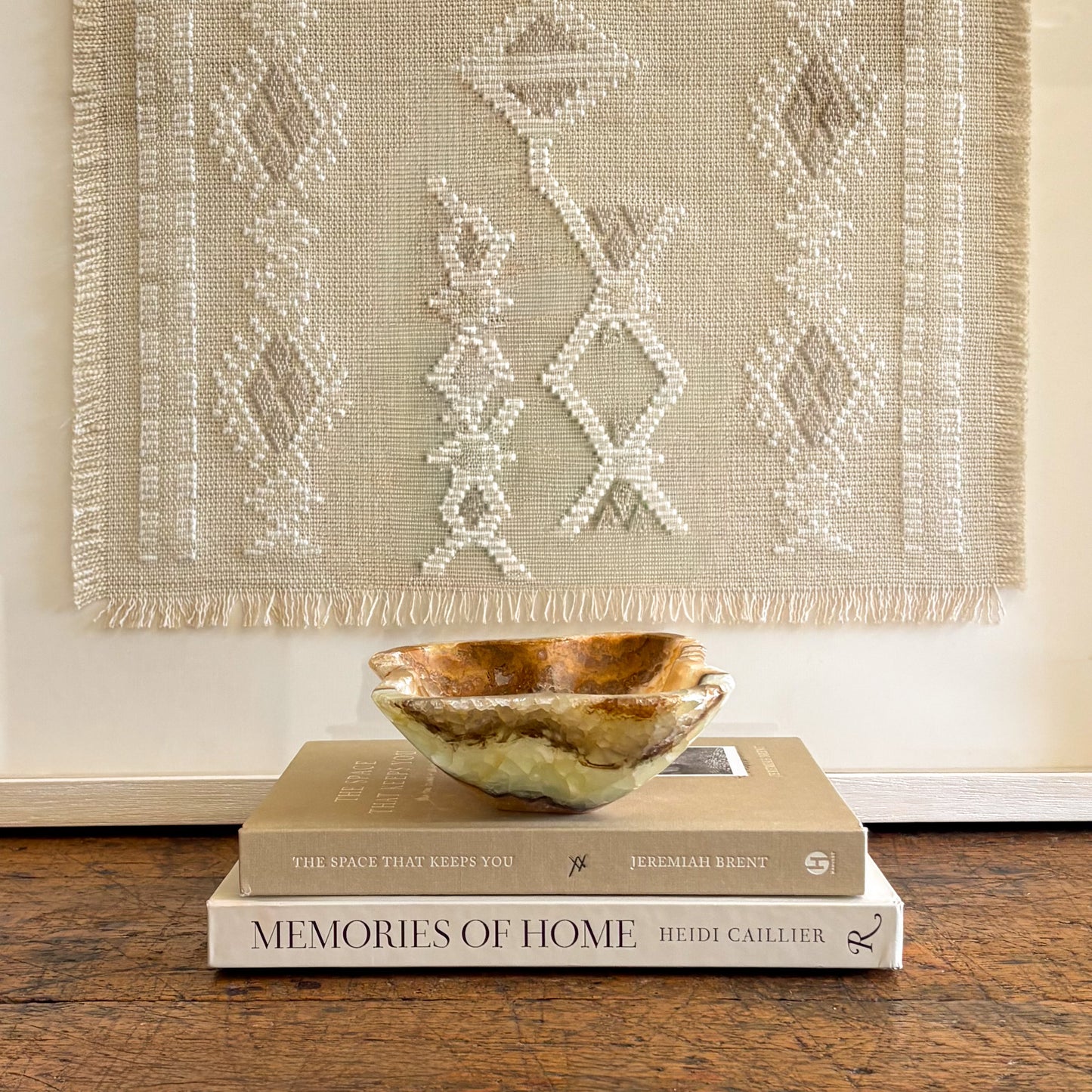 Textured onyx stone bowl highlighting natural veining and translucent mineral layers