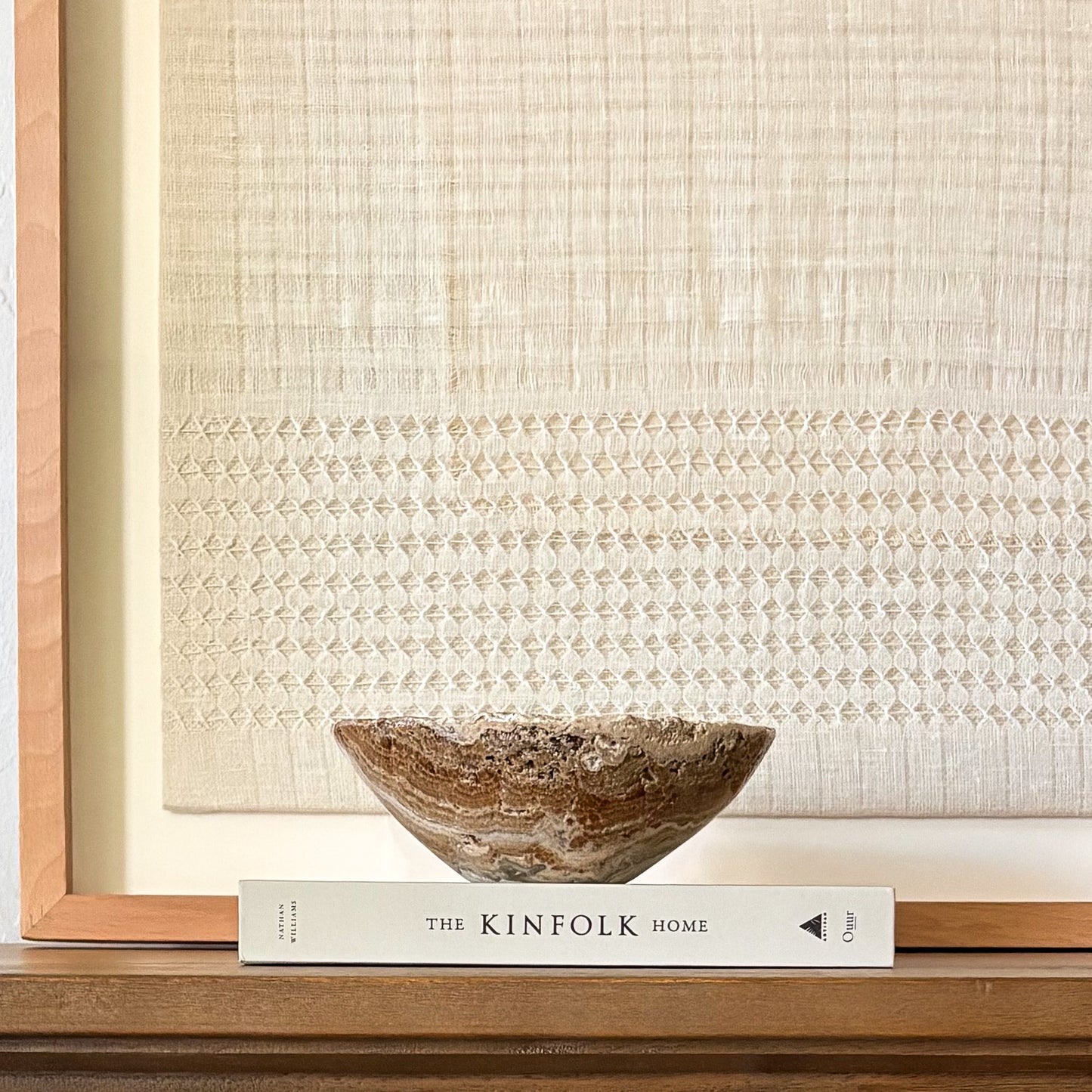 Small hand carved amber onyx bowl, natural stone decorative dish with warm golden tones