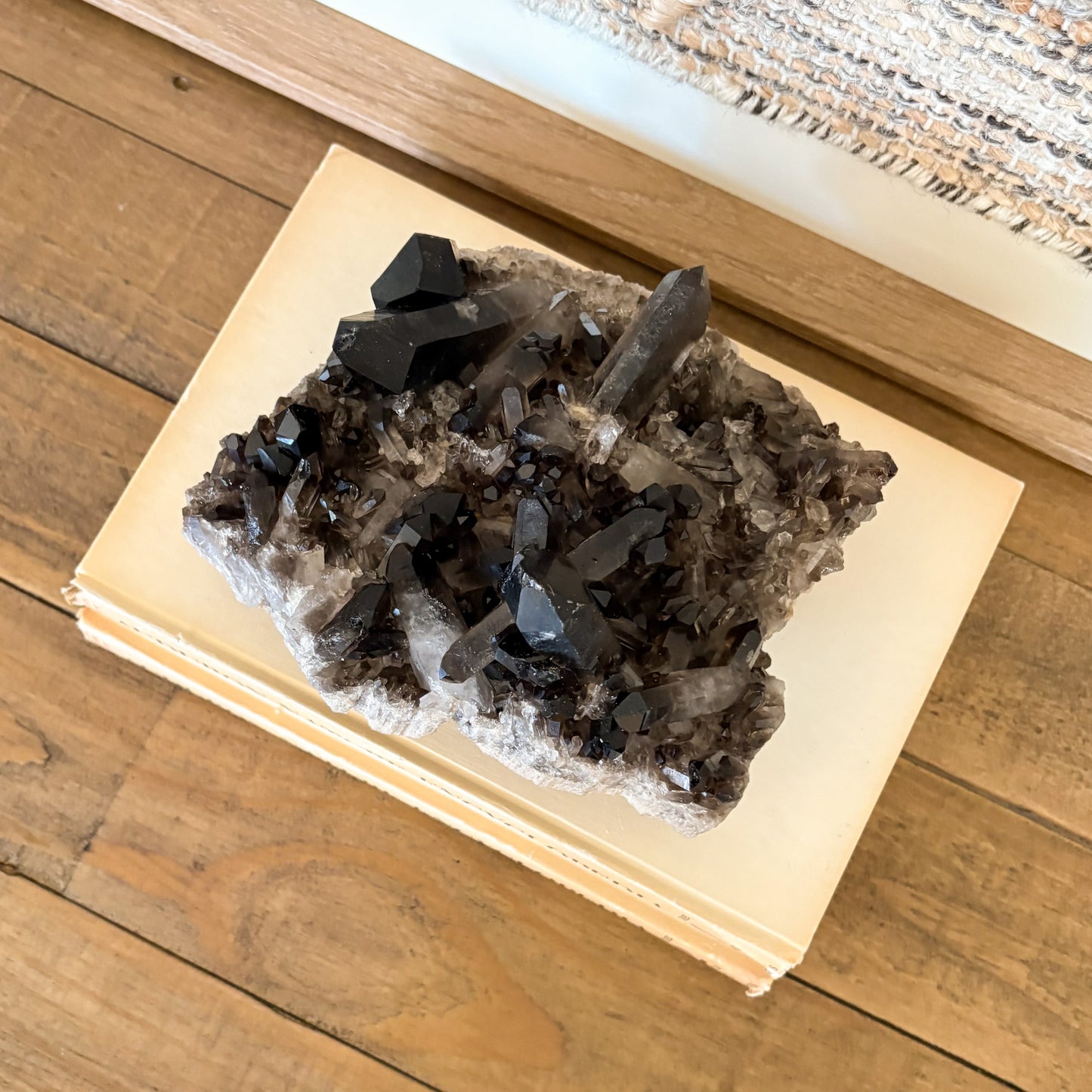 Raw smoky quartz crystal cluster mineral specimen used for spiritual and boho home decor.