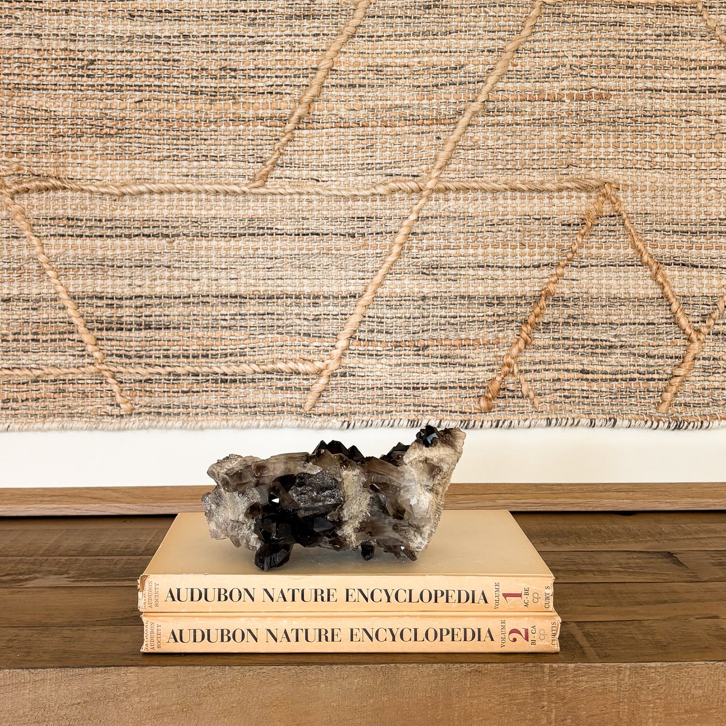 Smoky quartz crystal cluster luxury decor piece with natural brown quartz points.