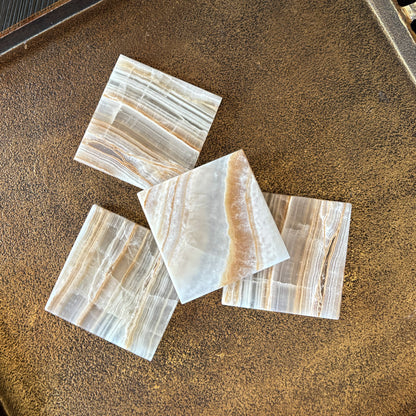white and brown stone coasters