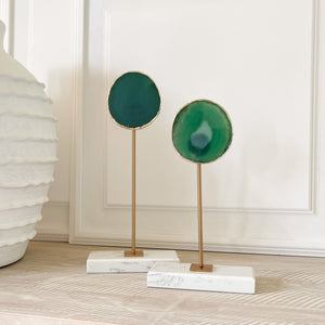 green agate on marble and brass stand