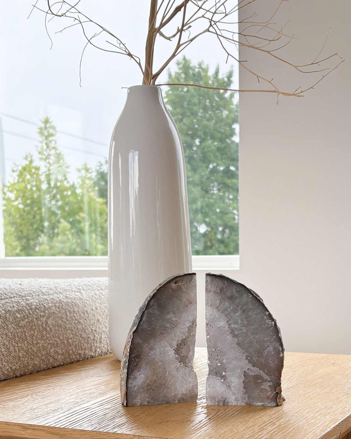 Polished agate bookend pair with raw druzy crystal
