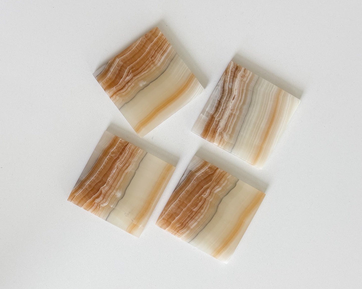 Natural amber onyx coasters for coffee table and home bar décor