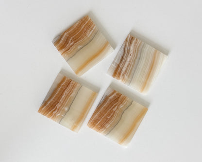 Natural amber onyx coasters for coffee table and home bar décor