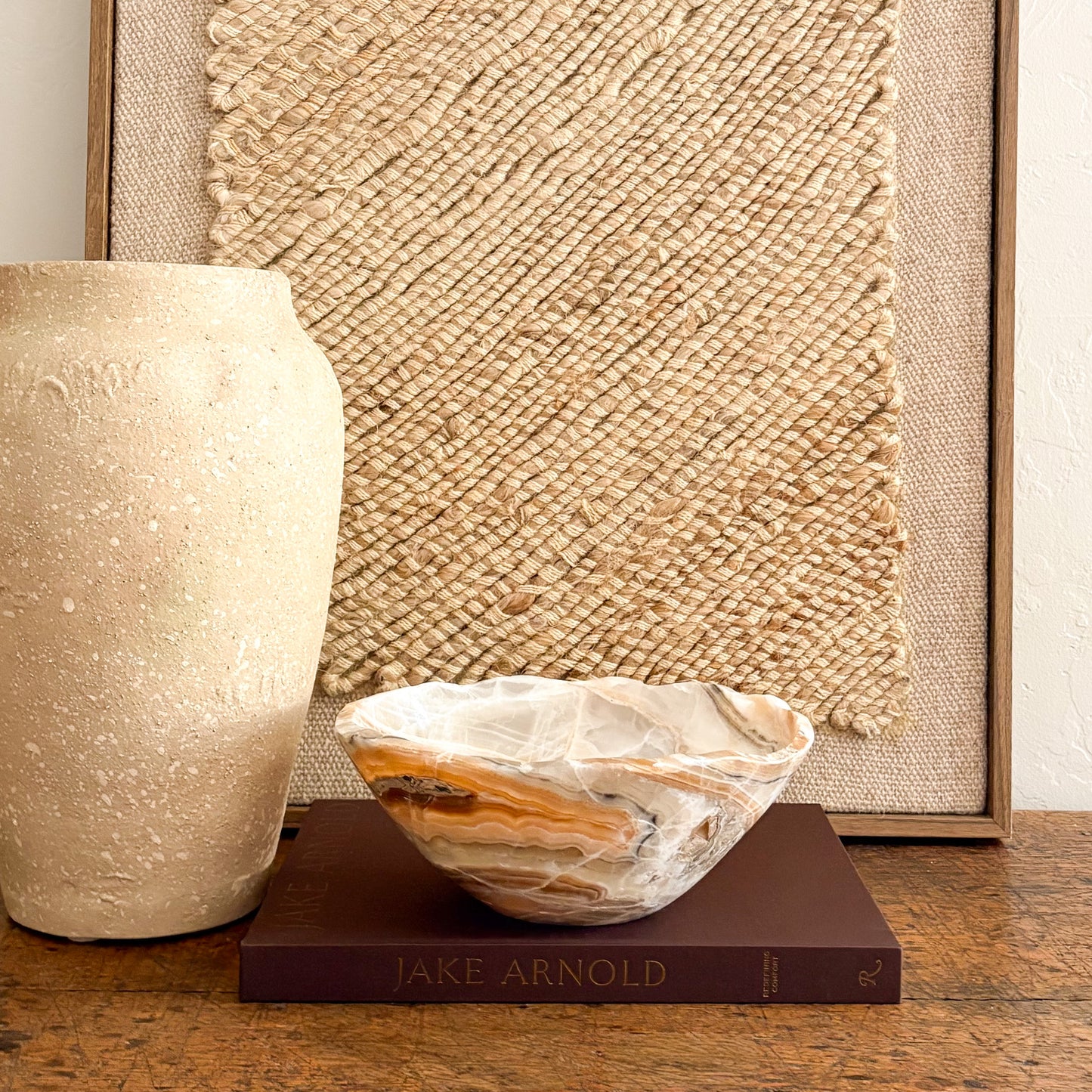 Decorative amber onyx bowl handcrafted from natural stone, one of a kind carved stone bow