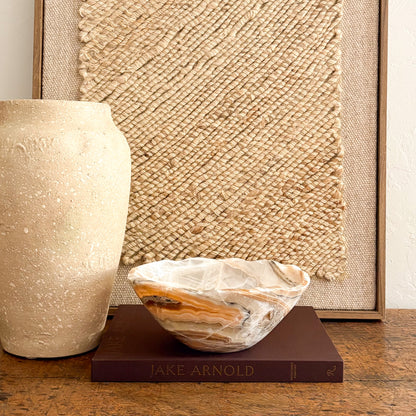 Decorative amber onyx bowl handcrafted from natural stone, one of a kind carved stone bow