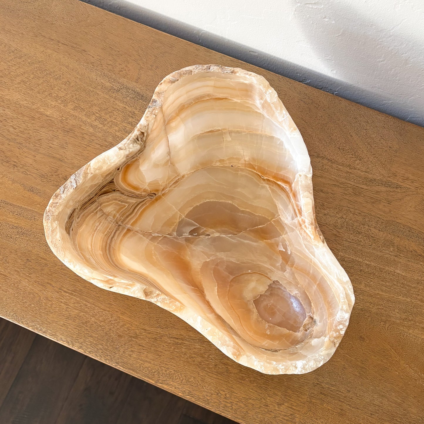 Natural amber onyx decorative bowl with polished finish and earthy brown veining
