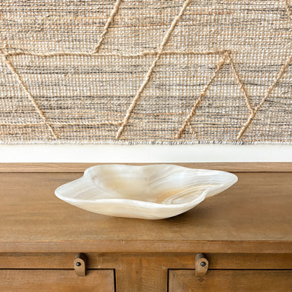 Amber onyx centerpiece bowl styled on wooden console table