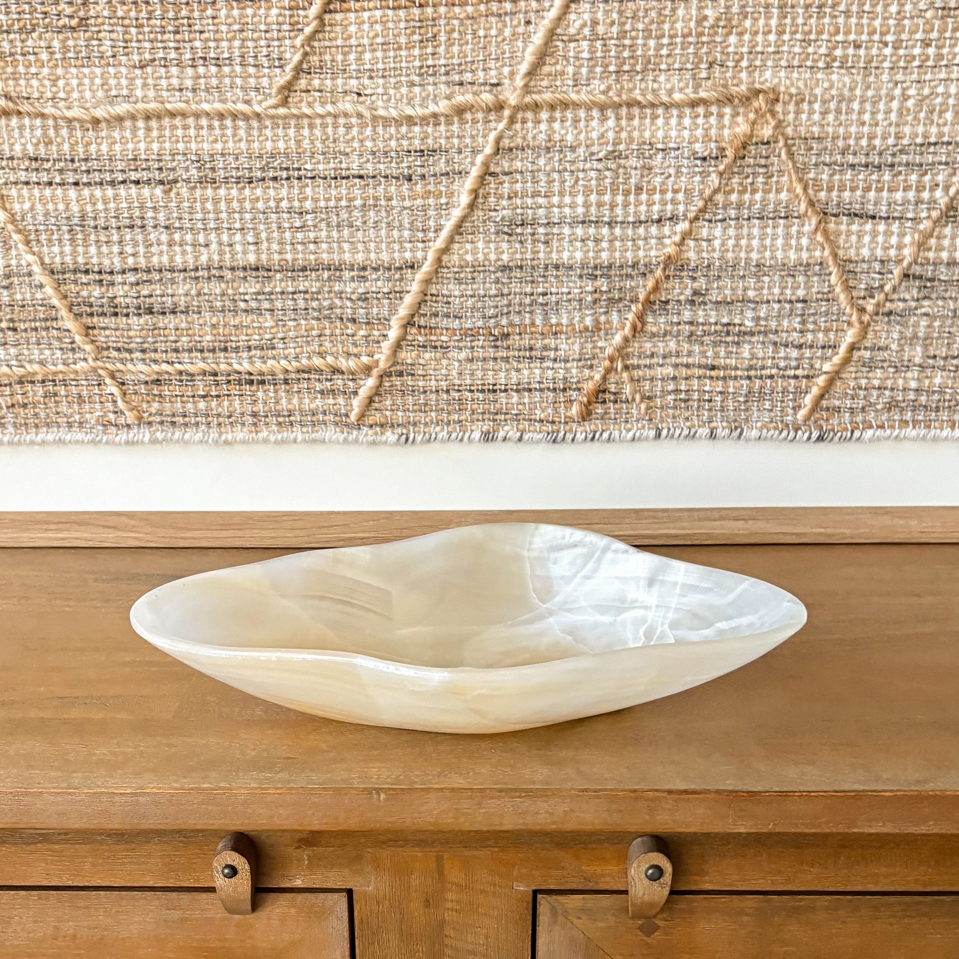 Amber onyx bowl styled with neutral interior design
