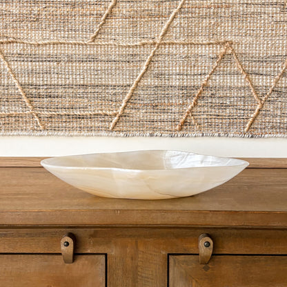 Amber onyx centerpiece bowl styled on wooden console table