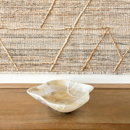 Amber onyx centerpiece bowl styled on wooden console table