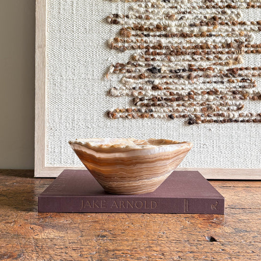 brown and white onyx bowl
