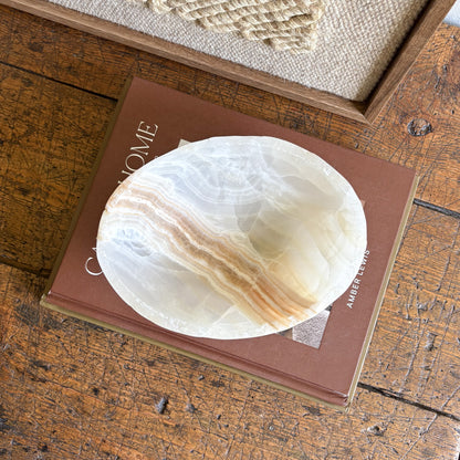 decorative brown and white onyx bowl