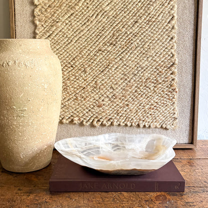 Decorative brown and white onyx bowl