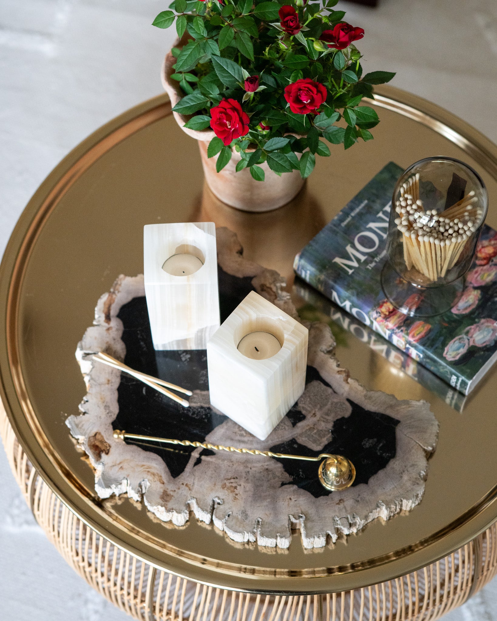 Hand-carved amber onyx candle holder with warm golden veining