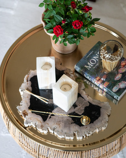 Hand-carved amber onyx candle holder with warm golden veining