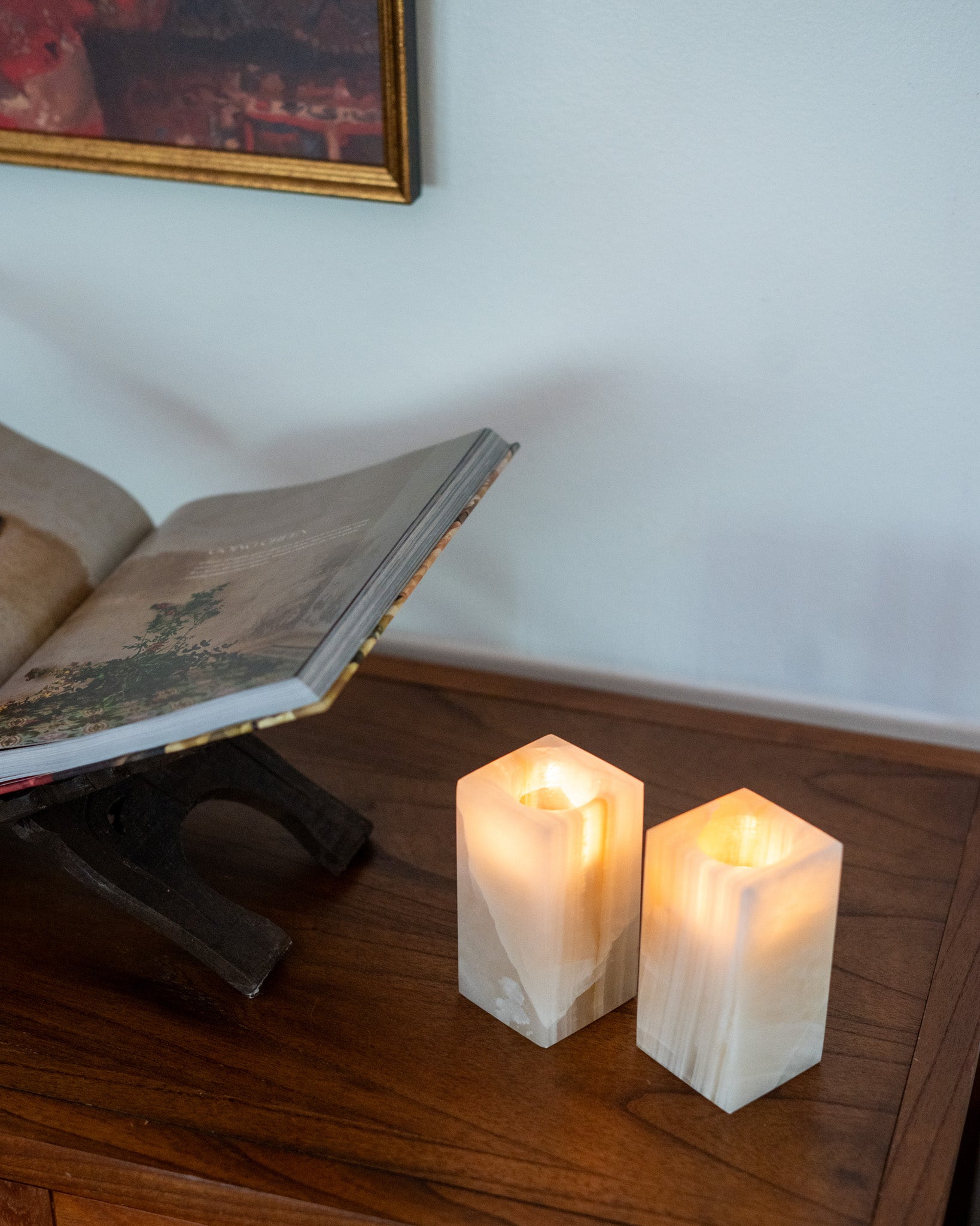 One-of-a-kind amber onyx votive candle holder with polished finish