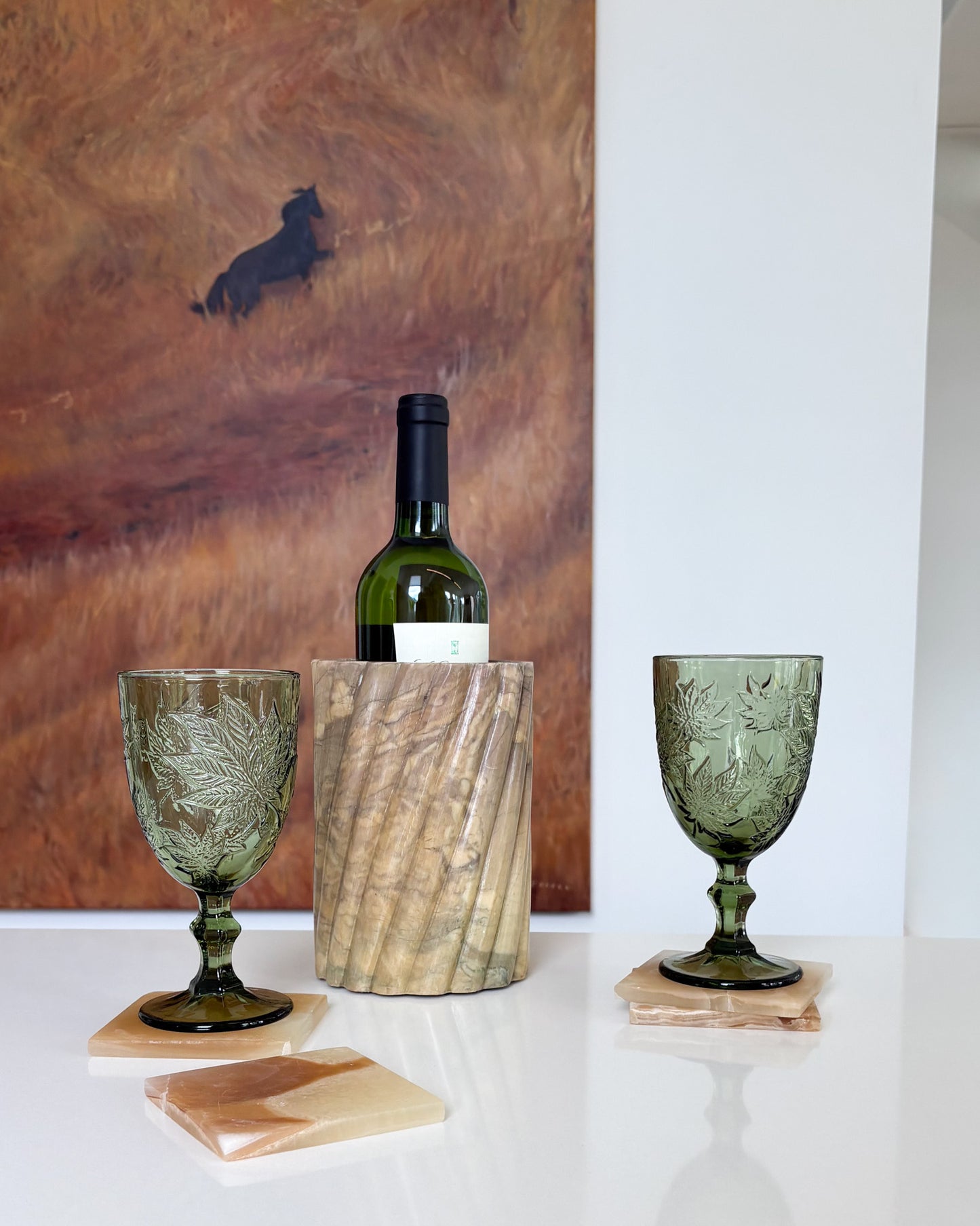 Luxury amber onyx drink coaster set with warm honey and ivory veining