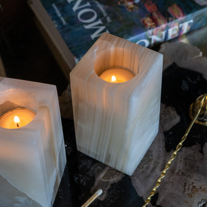 Modern luxury candle décor featuring amber onyx tealight holders