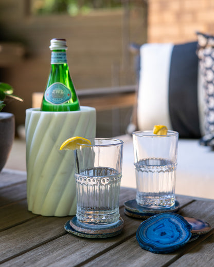 Polished blue agate coaster set with organic banding