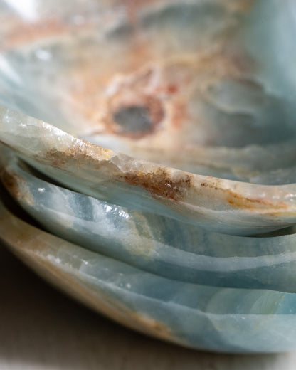 Handcrafted blue onyx dish with one-of-a-kind natural color variations