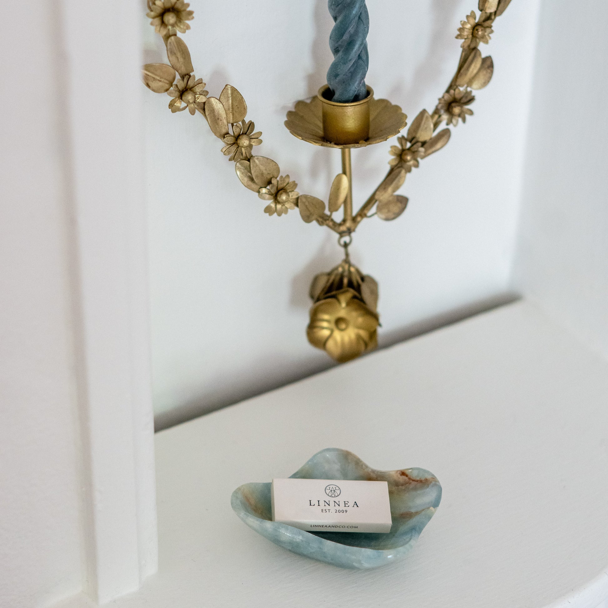 Decorative blue onyx bowl for vanity styling and bedside jewelry organization