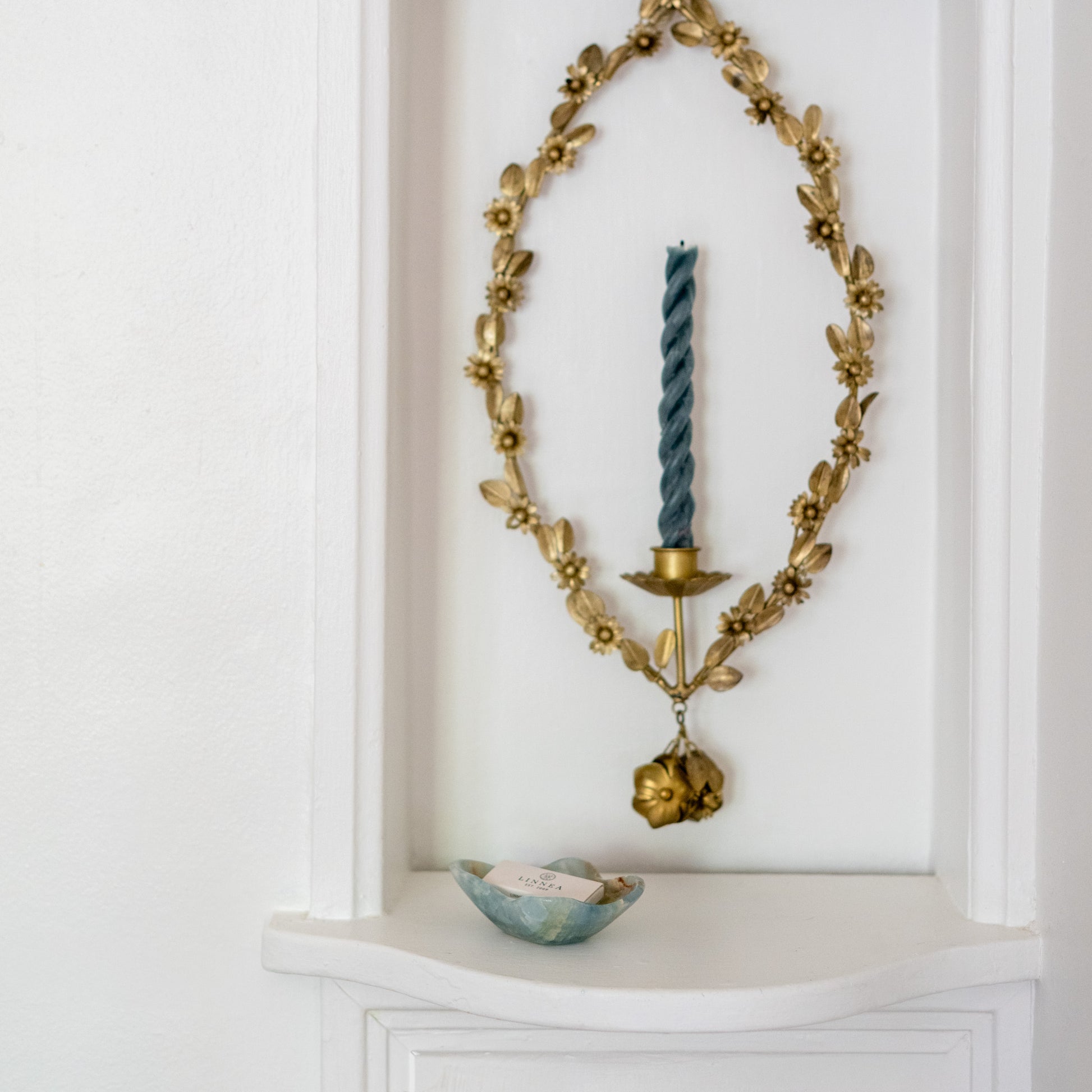 Natural blue onyx trinket tray displayed with elegant vintage-inspired home décor