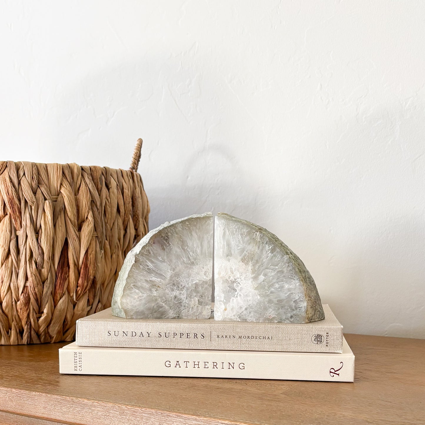 Brazilian agate geode center bookend pair with natural crystal quartz interior and polished agate edges in neutral earth tones