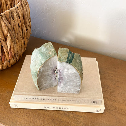 Brazilian agate geode bookends with green banding and light amethyst quartz crystal center