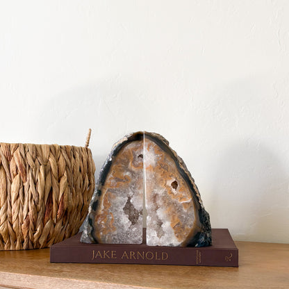 Brazilian agate geode bookends with green banding and light amethyst quartz crystal center