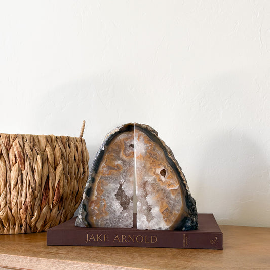 Brazilian agate geode bookends with green banding and light amethyst quartz crystal center