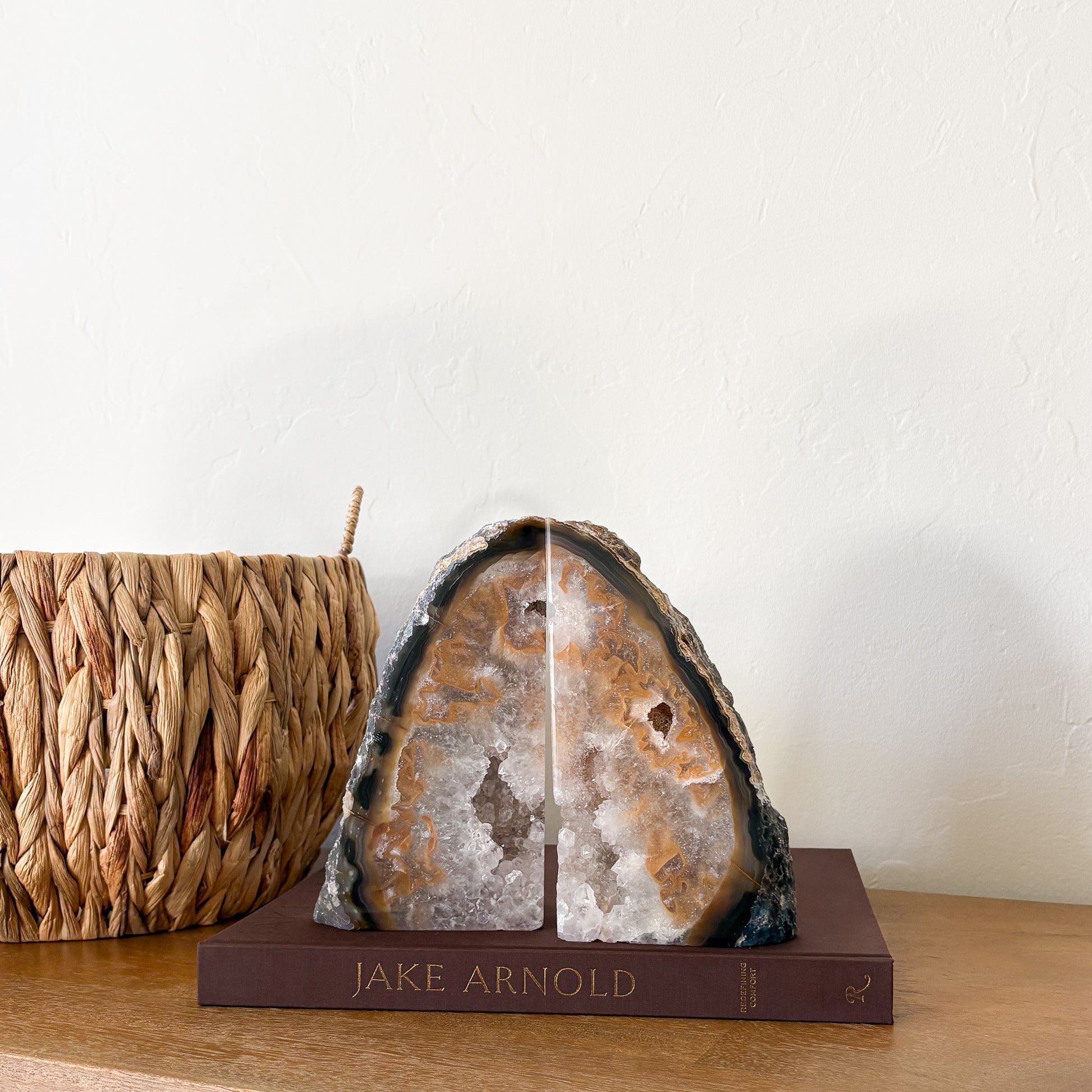 Matching Brazilian agate geode bookends featuring golden caramel agate layers and sparkling white quartz crystal interior