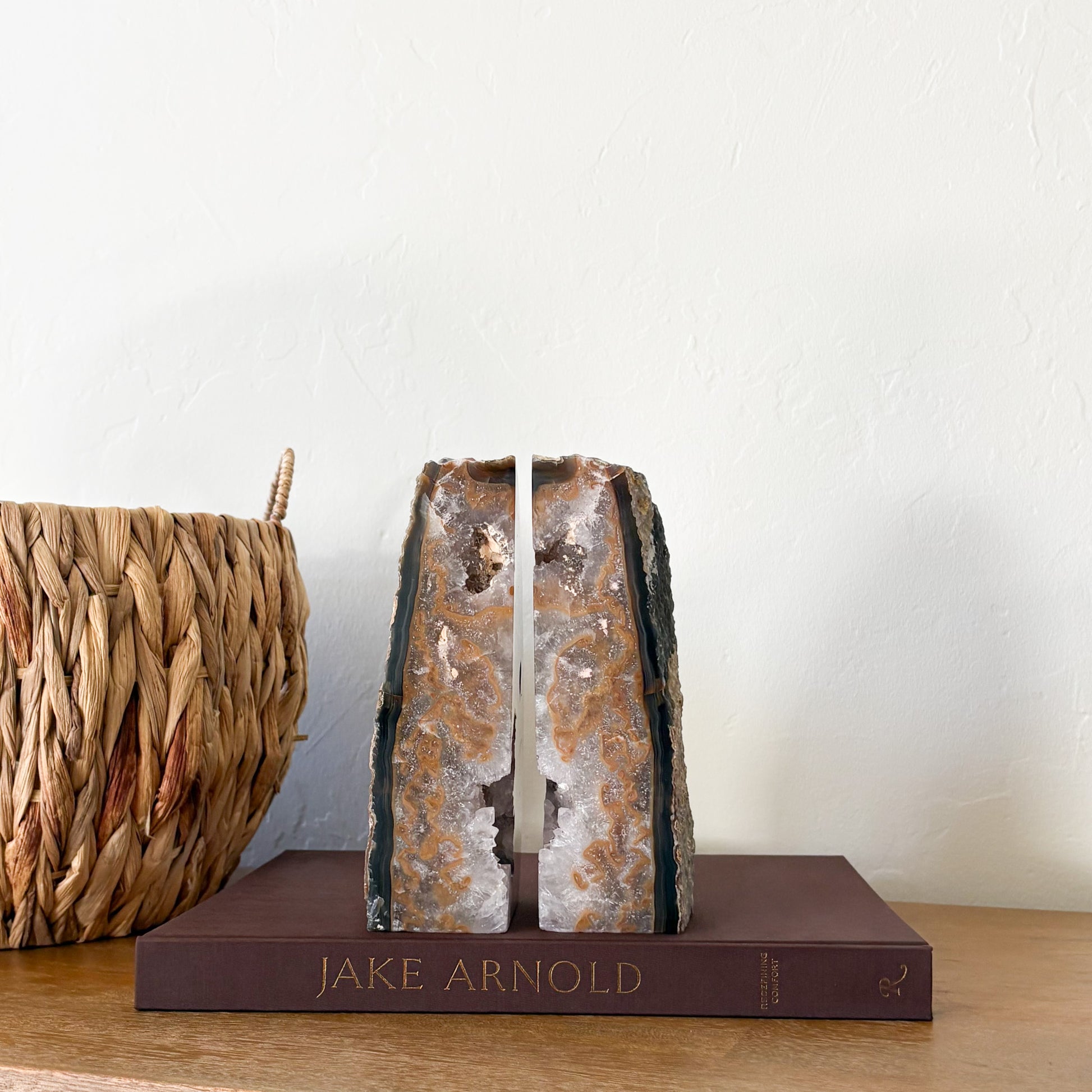 Brazilian agate geode bookends with amber banding and white quartz crystal center