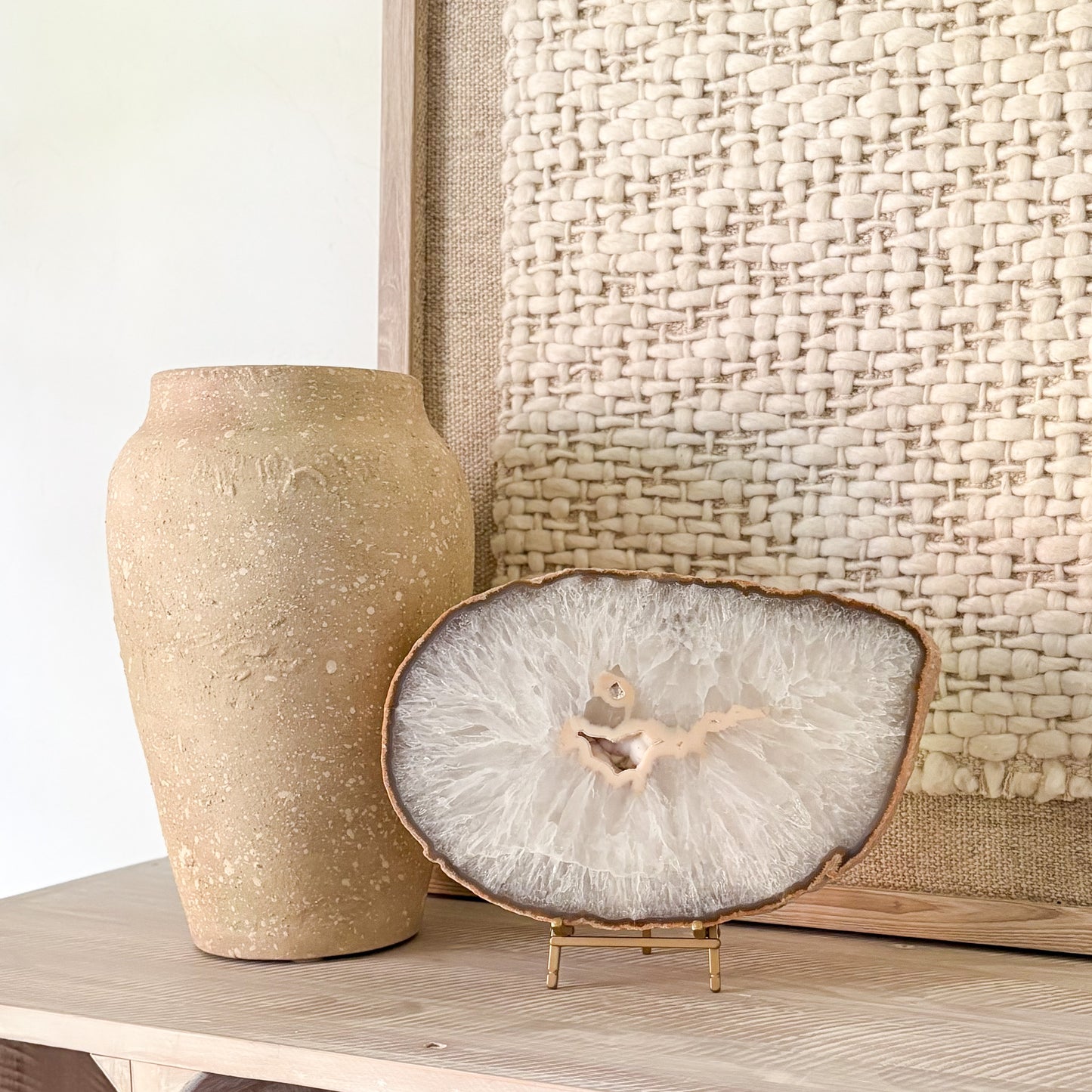 Natural Brazilian agate slab on bookshelf styling with luxury home accessories