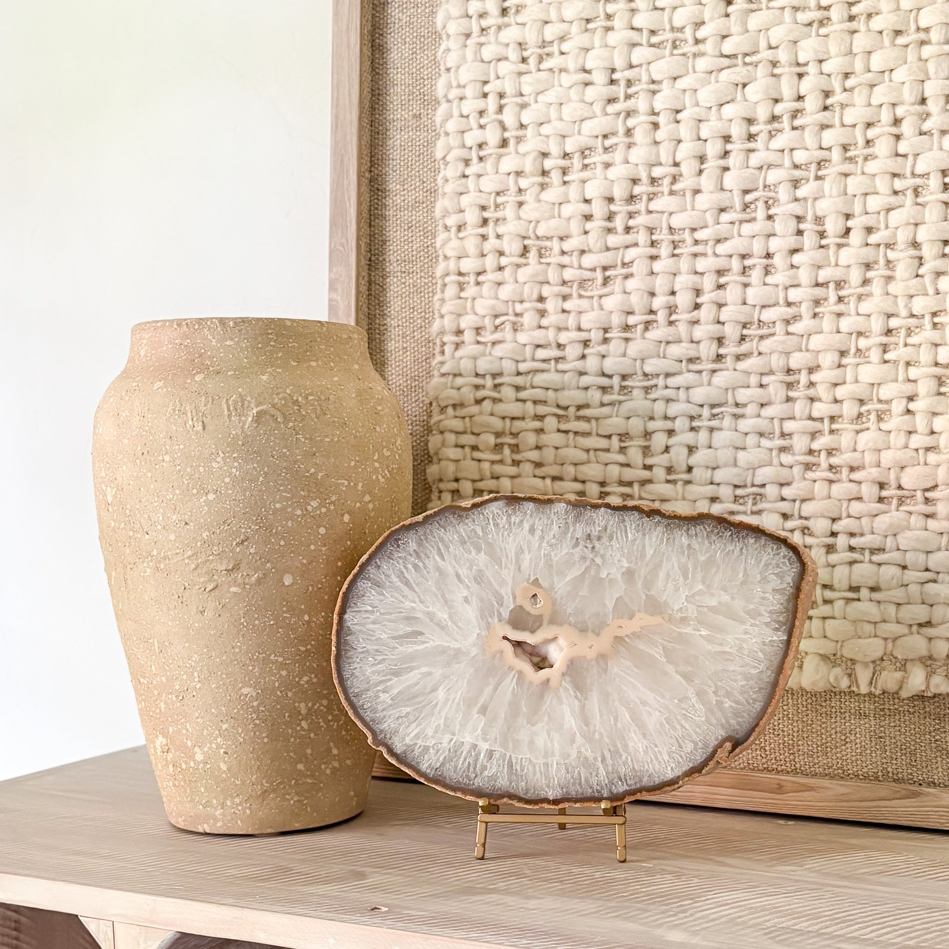 Natural Brazilian agate slab on bookshelf styling with luxury home accessories