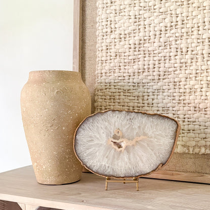 Natural Brazilian agate slab on bookshelf styling with luxury home accessories