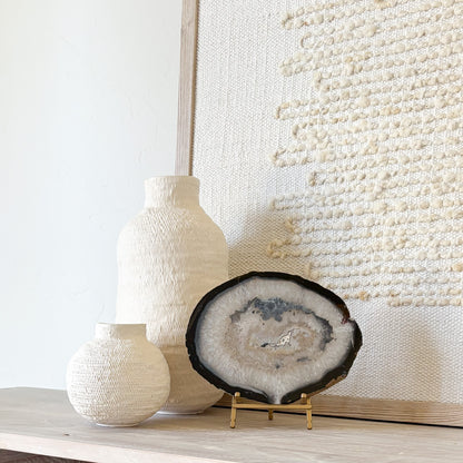 Brazilian agate slice on metal stand, natural crystal home decor accent with vibrant banded patterns