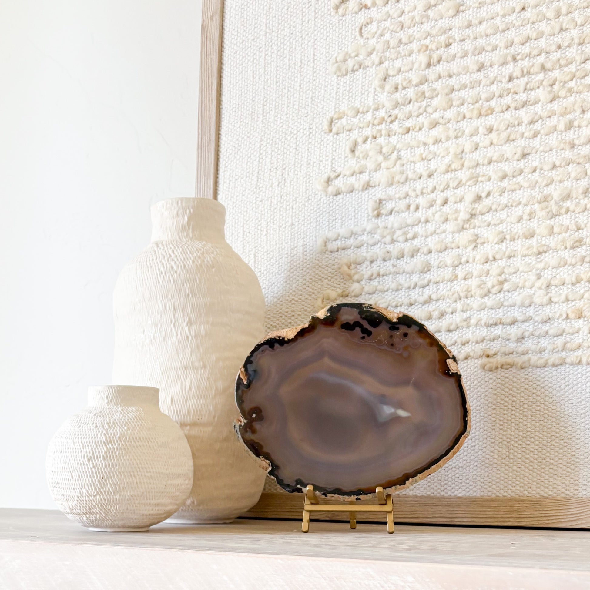 Blue Brazilian agate slice display on stand, elegant gemstone decor for office or home